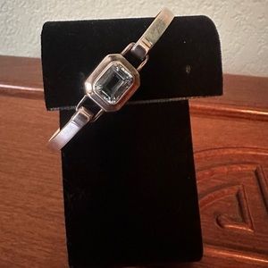 Elegant blue topaz and 925 sterling bracelet.